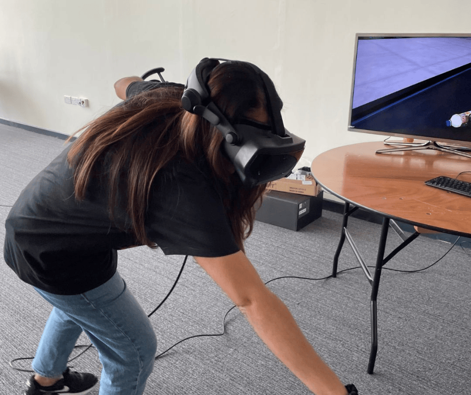 A pupil at Gower College Swansea tried the VR system supplied by CWM