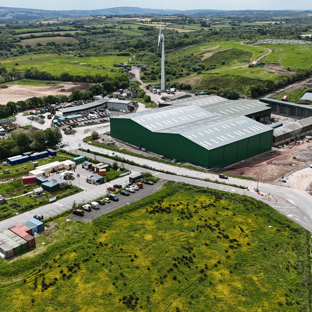 Site wide drone shot of site during summer